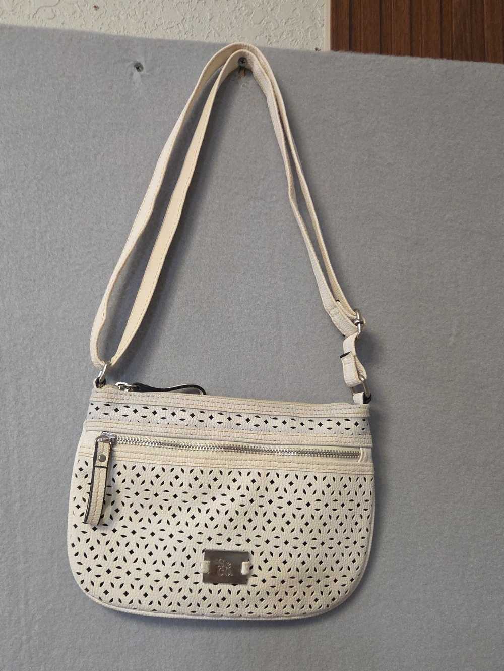 Stone & Co. Ivory White Laser Cut Perforated Leather Crossbody Shoulder Bag.